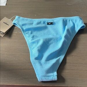 NWT! Nike Light Blue  Swim Bottoms. Women’s medium